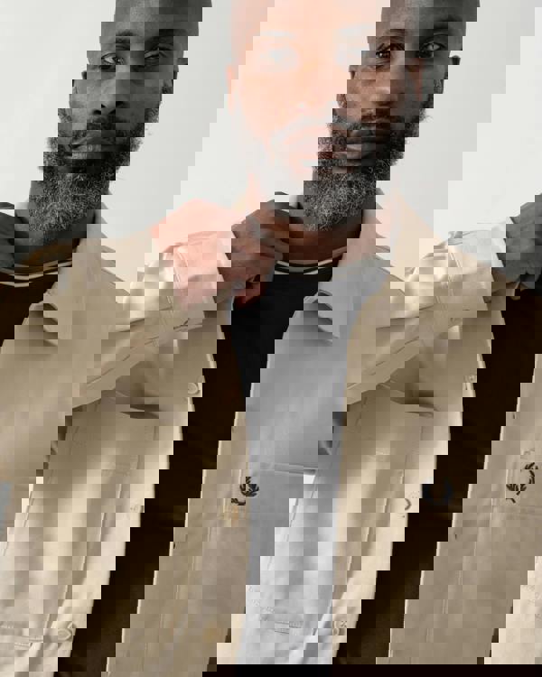 detail shot of a Model wearing a Fred Perry Mens Twill Overshirt in Oatmeal