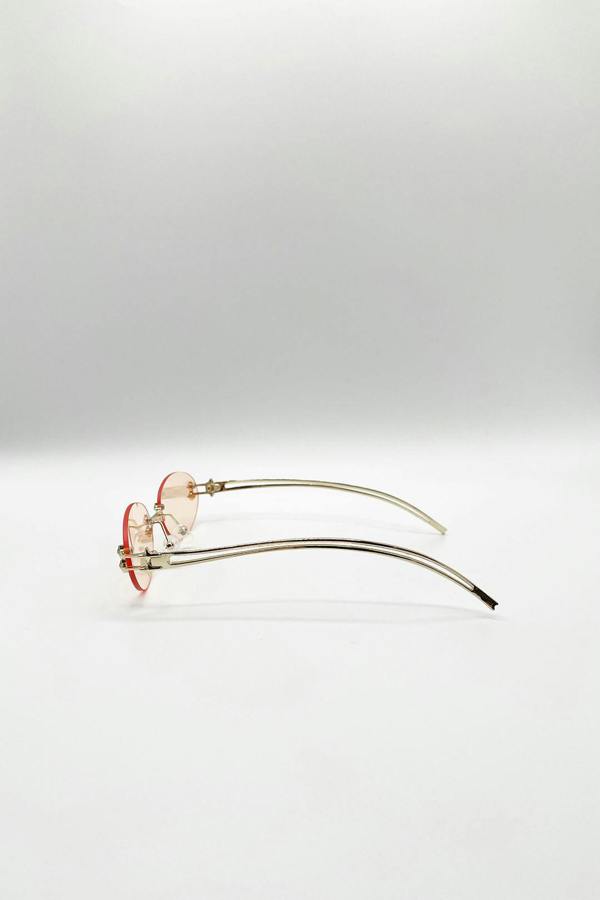 Rimless Oval Sunglasses In Brown - svnx