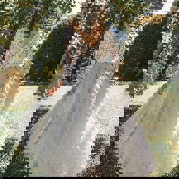 Flower girl swirling in the dress