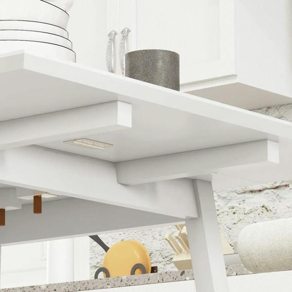 Underside view of white drop-leaf folding dining table showing support bars