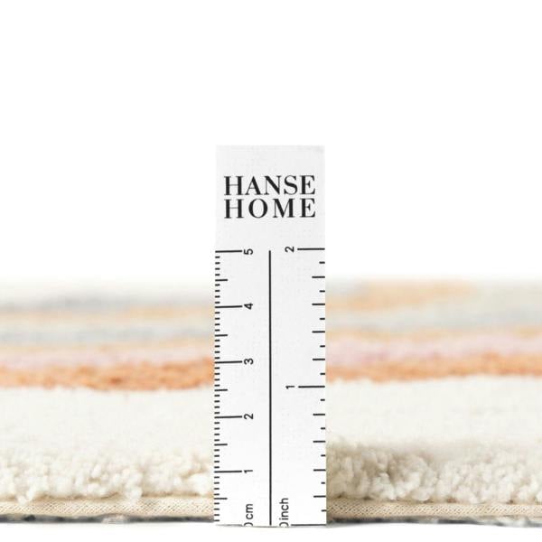 Hanse Home rug with a ruler for scale on a white background