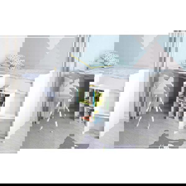 White mid sleeper bed frame in a modernly decorated bed room.