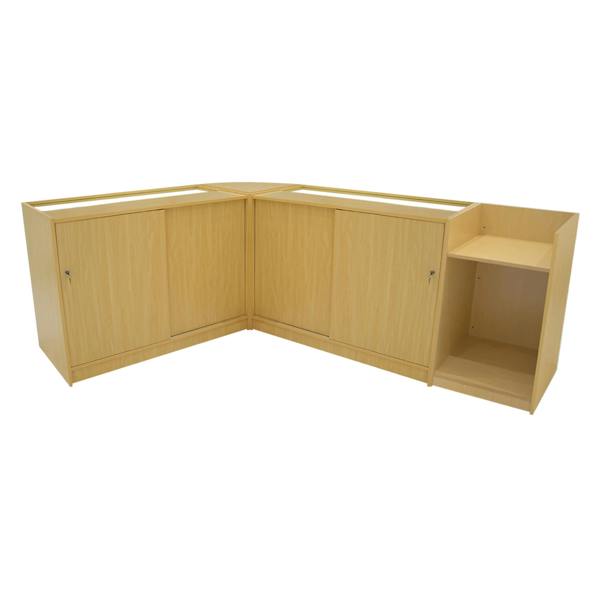 Gravity LED Shop Counter Set in maple finish, featuring sleek lines, ample storage with cabinets, and a modern design for retail spaces