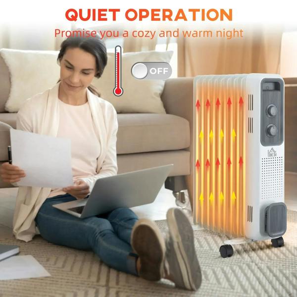 White oil-filled radiator heater with warm heating glow through fins and control knobs.