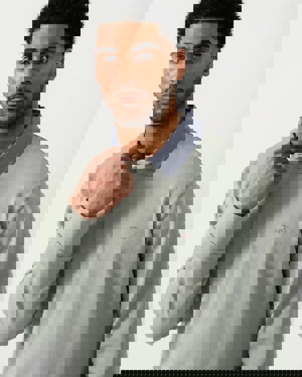 detail view of a model wearing a GANT Mens Regular Chambray Heavy Rugger in 10 Ceramic Grey