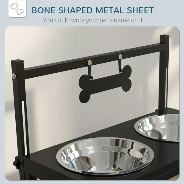 Black elevated dog bowl stand with bone-shaped support bar and two stainless steel bowls