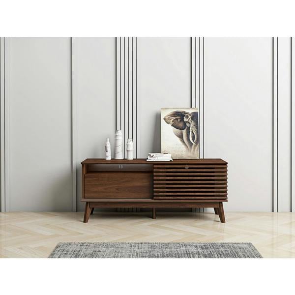 TV cabinet in a modernly decorated living room. It shows the cupboard, internal drawer and 2 shelfs in use with a TV on top.