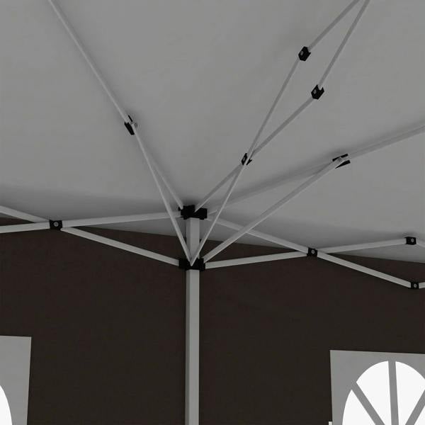Interior support frame of pop-up gazebo with white crossbeams and central pole