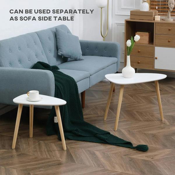 Stacking end tables used separately as sofa side tables with white tops and wood legs