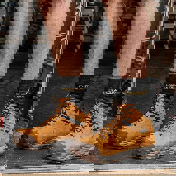 DeWalt Summit Mens Lace Up Safety Work Steel Toe/Midsole S3 Ankle Boots, in tan color, with black laces and safety features, worn by a person in a workshop environment.