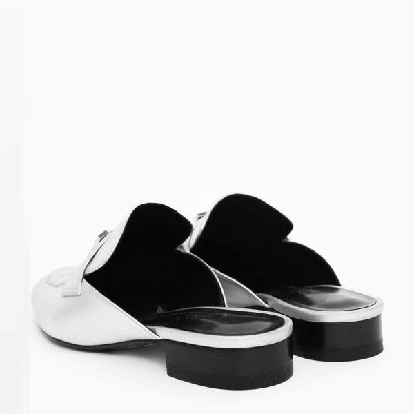 Hermes Trocadero mules in a metallic silver grained leather