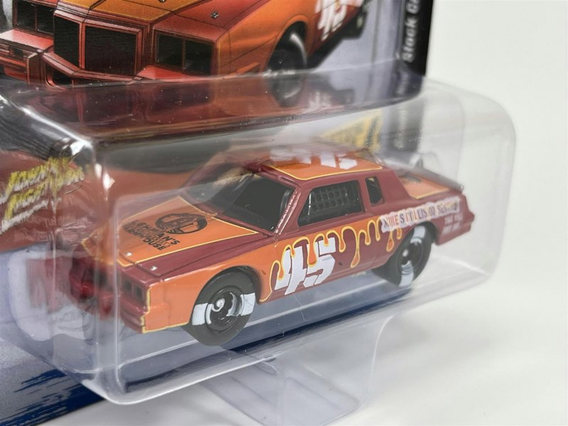 Johnny Lightning 1982 Pontiac Grand Prix Stock Car 6 Cans of Deep Red with Orange 1:64 Scale JLSF024B