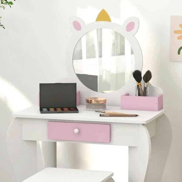 Kids unicorn vanity table set with round mirror, laptop, and brush holder on white top.