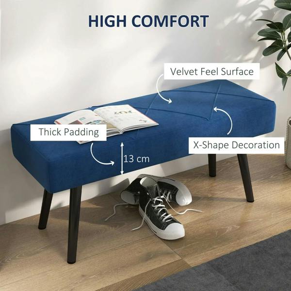 Blue upholstered bench with thick padding and X-shaped base