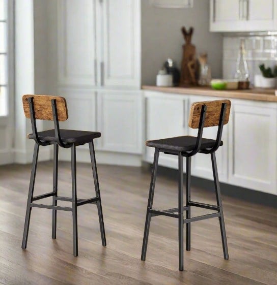 Set of 2 industrial bar stools in rustic brown and black PU leather with ergonomic backrest and metal footrests, ideal for kitchen or bar use

