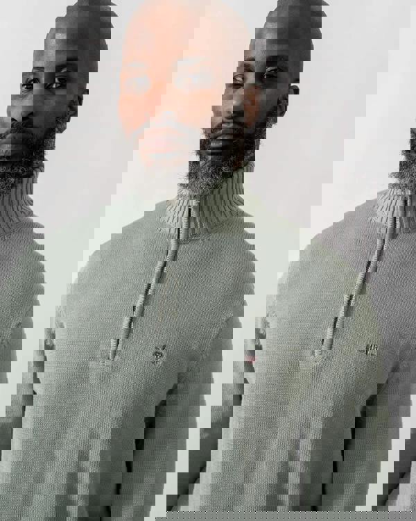 Model wearing GANT Mens Casual Cotton Half Zip Jumper in 10 Ceramic Grey - Detail