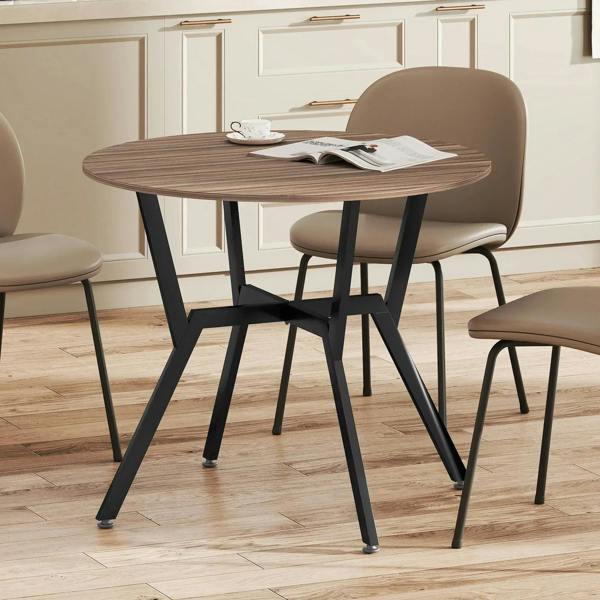 Round brown kitchen table with black metal legs and flat striped wood top