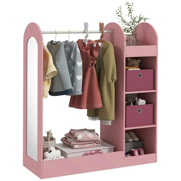 Pink kids clothes rail with storage shelf, hanging clothes, and mirror, with cubby bins