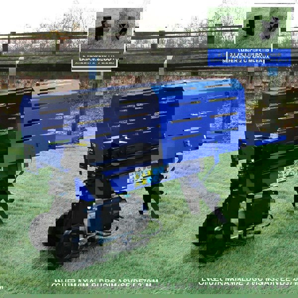 T-Mech 5T Log Splitter in blue with a sturdy design, featuring a 370mm log capacity and safety labels, set on grass outdoors
