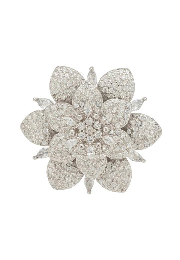 Silver flower-shaped ring with clear gemstones on a white background