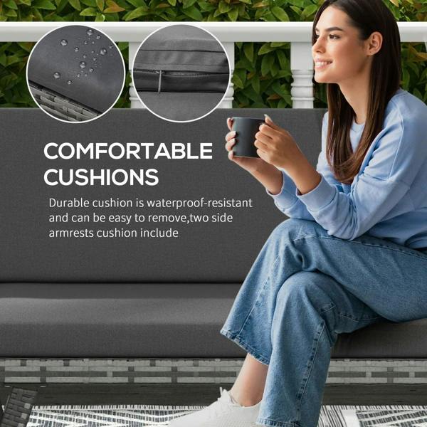 Grey cushioned rattan sofa with armrests, close-up on seat and back cushions