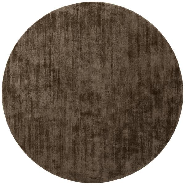 Round brown rug on a white background