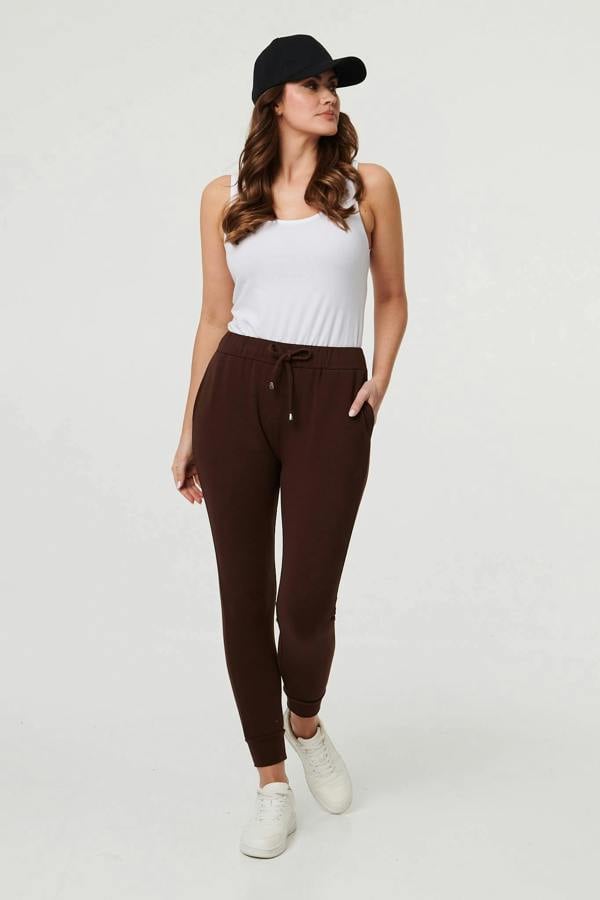Brown | Adjustable Drawstring Waist Slim Joggers : Model is 5'9"/175 cm and wears UK10/EU38/US6/AUS10