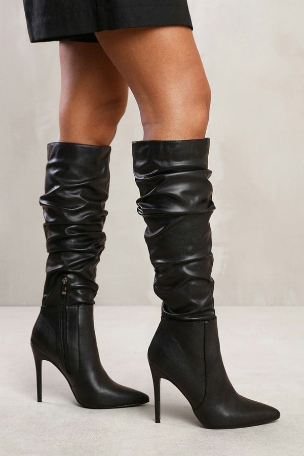 Where's That From Alessia Below Knee High Heel Slouch Boot in Black Faux Leather