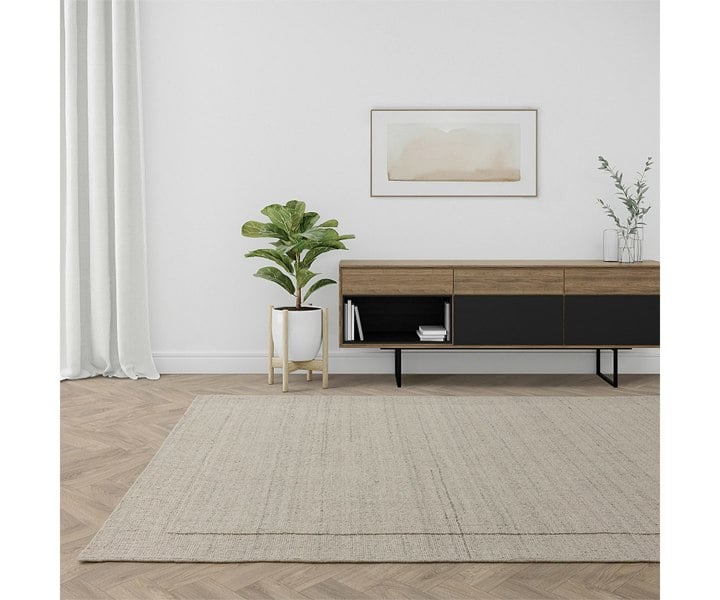 Luxury Larson Ivory rug by Asiatic London, ideal for high-end interior decor.