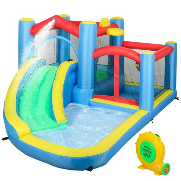 Inflatable bouncy castle with slide, blue/red/yellow walls and attached blower fan