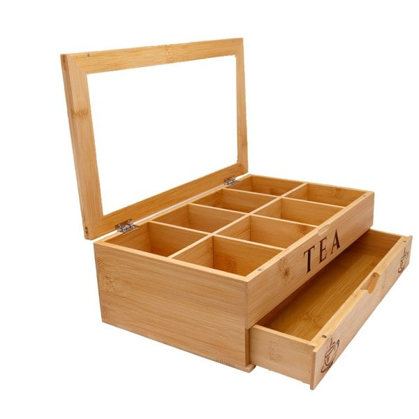 Wooden tea box with compartments and a drawer on a white background