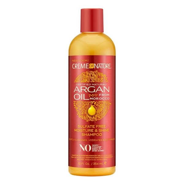 Creme of Nature Argan Oil shampoo bottle on a white background