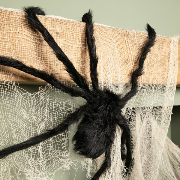 Samuel Alexander 90cm Black Furry Halloween Spider Decoration with Extendable Legs and Red Eyes