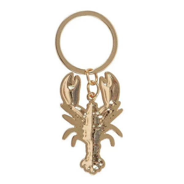 Gold-tone keyring ring with gold-tone lobster enamel charm