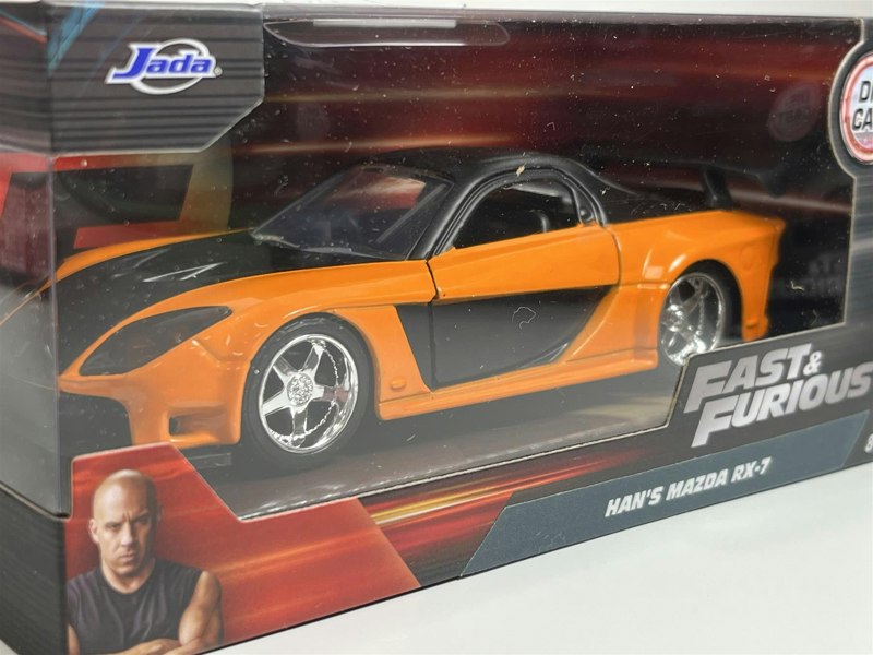 a toy car in a box