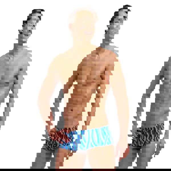 Funky Trunks Snork City Sidewinder swim trunks in blue with green leaf pattern