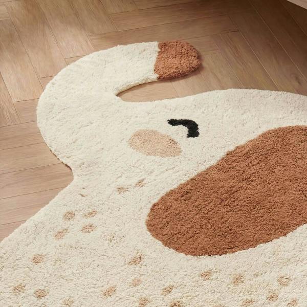 Dog-shaped rug on a wooden floor