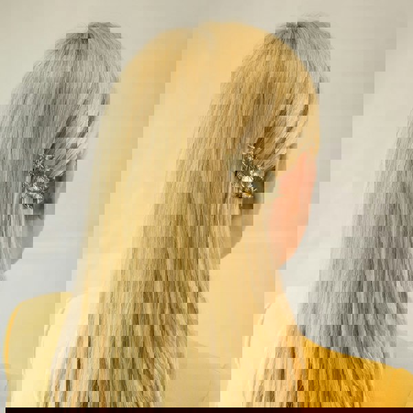 leaf hair barrette in gold worn with hair down