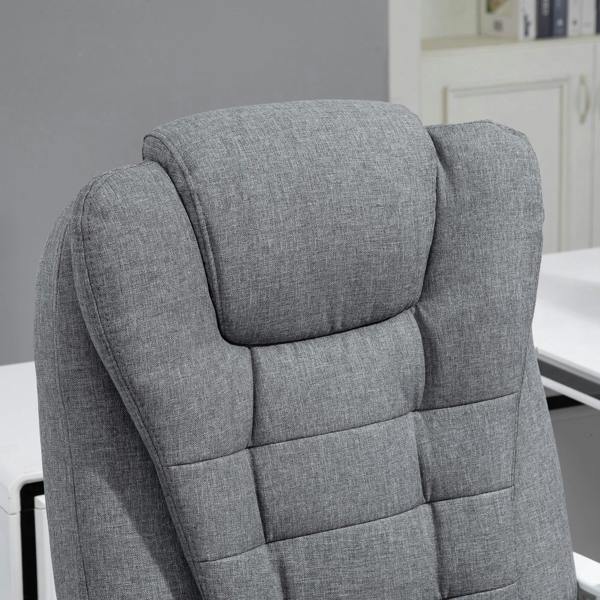 Close-up of grey high-back executive office chair upholstery with padded headrest and lumbar section