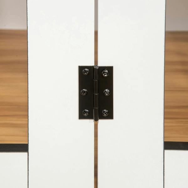 Black hinge hardware on a white dog crate door panel