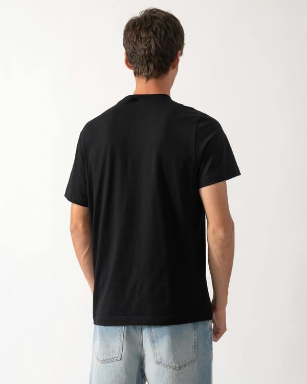 back of a model wearing a Moose Knuckles Mens Icebreak Logo T-Shirt in Black 292