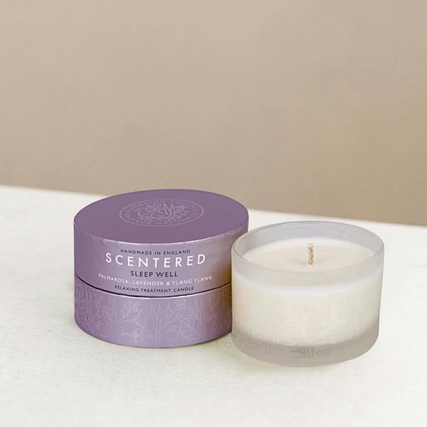 Scented sleep well candle and packaging on display.