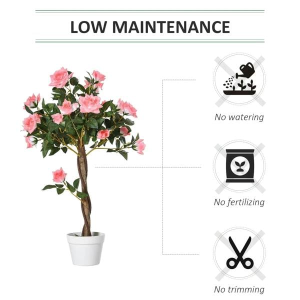 Artificial pink rose floral plant in white pot with green leaves and textured trunk