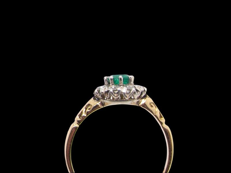 Vintage Tom A vintage Emerald and Diamond cluster ring