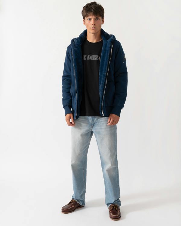 full length of a model wearing a Moose Knuckles Classic Bunny 3 Mens Fleece Hoodie in Nightfall 2017 