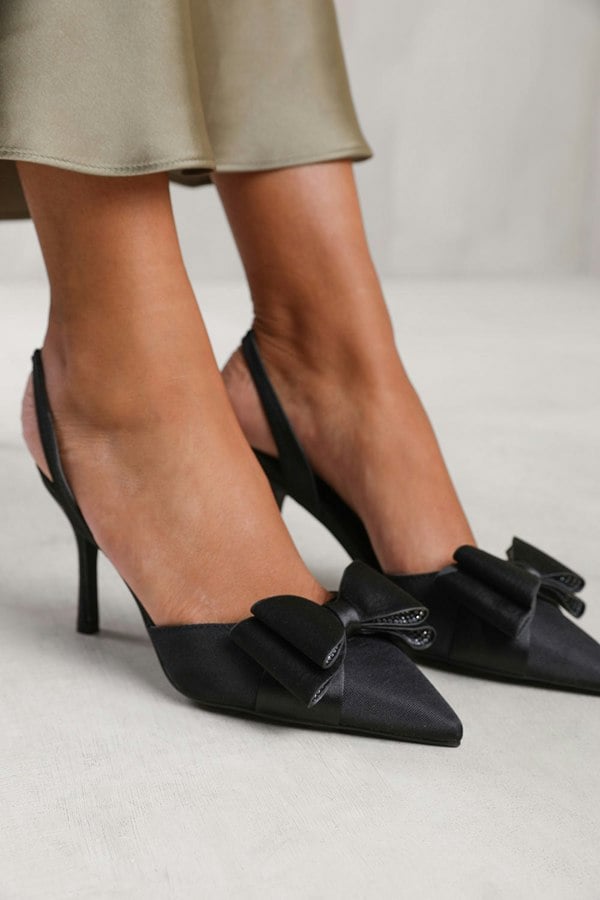 Where's That From Spain Wide Fit Pointed Toe With Diamante Bow Detailing Slingback Mid Heels in Black Satin