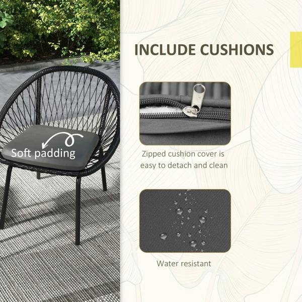 Black rattan armchair with cushioned seat and water-resistant zipper cushion cover