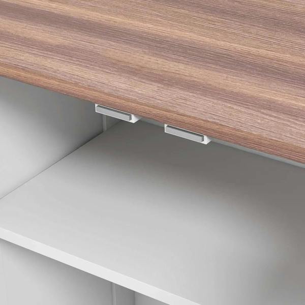 Underside view of raised tabletop with adjustable support rails on feeding station