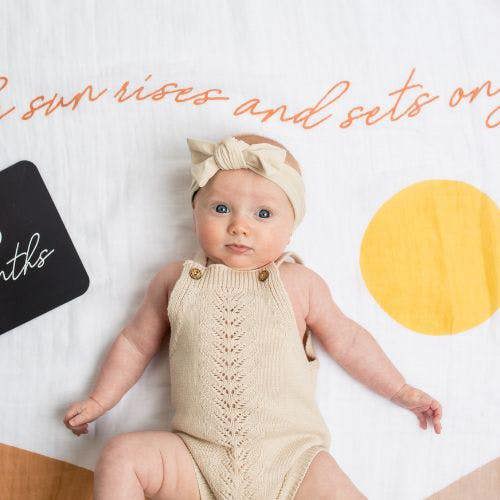 Lulujo - Baby's First Year Gift Set -  Cotton Swaddle & Cards - Sun Rises