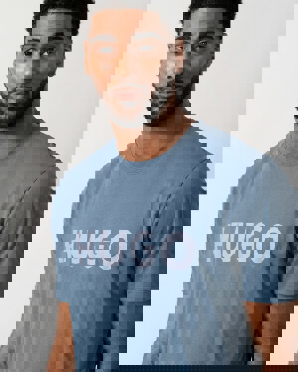 Detail shot of a Model wearing a HUGO Dulivio Mens T-Shirt in Open Blue